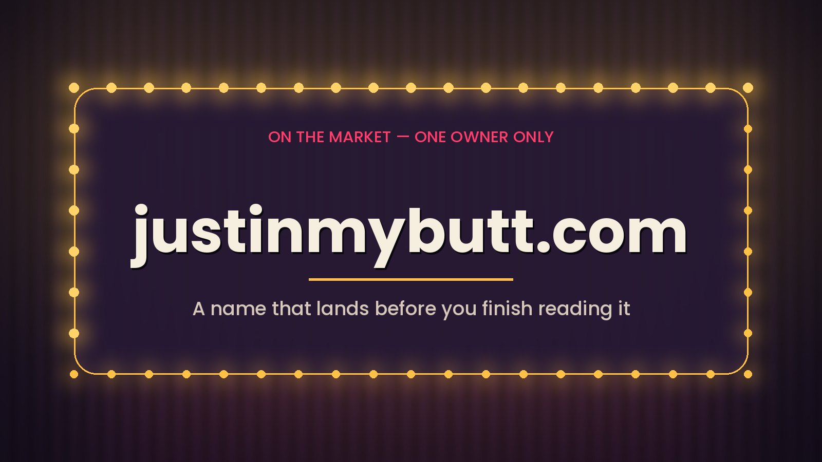 A lit theater marquee spelling out justinmybutt.com above a row of amber bulbs